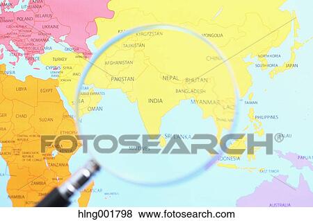 World map and magnifying glass View Large Photo Image Stock Photo - World map and magnifying glass. Fotosearch