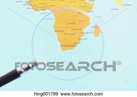 World map and magnifying glass View Large Photo Image Stock Photo - World map and magnifying glass. Fotosearch