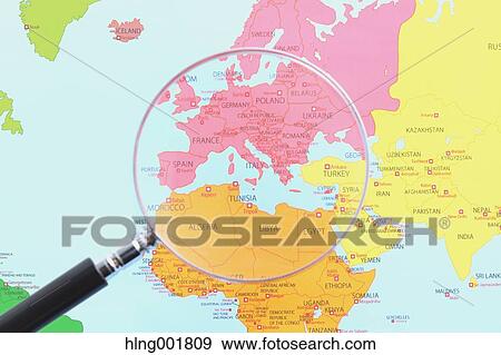 World map and magnifying glass View Large Photo Image Stock Photo - World map and magnifying glass. Fotosearch