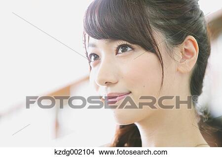 Young attractive Japanese female University student portrait View Large Photo Image Picture - Young attractive Japanese female University student portrait. Fotosearch