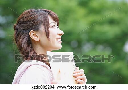 Young attractive Japanese female University student portrait View Large Photo Image Picture - Young attractive Japanese female University student portrait. Fotosearch