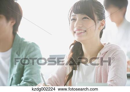 Young attractive Japanese female University student portrait View Large Photo Image Picture - Young attractive Japanese female University student portrait. Fotosearch