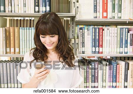 Young attractive Japanese female University student portrait View Large Photo Image Picture - Young attractive Japanese female University student portrait. Fotosearch