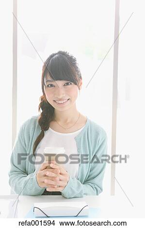 Young attractive Japanese female University student portrait View Large Photo Image Picture - Young attractive Japanese female University student portrait. Fotosearch
