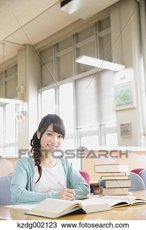 Stock Image - Young attractive Japanese female University student portrait. Fotosearch