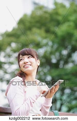 Young attractive Japanese female University student portrait View Large Photo Image Stock Image - Young attractive Japanese female University student portrait. Fotosearch