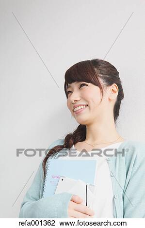 Young attractive Japanese female University student portrait View Large Photo Image Stock Image - Young attractive Japanese female University student portrait. Fotosearch