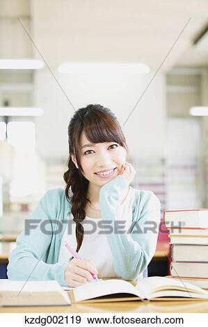 Young attractive Japanese female University student portrait View Large Photo Image Stock Photo - Young attractive Japanese female University student portrait. Fotosearch