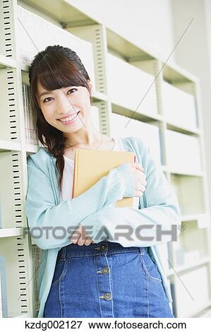 Young attractive Japanese female University student portrait View Large Photo Image Stock Photo - Young attractive Japanese female University student portrait. Fotosearch