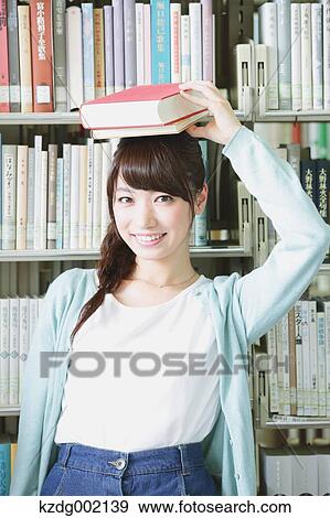 Young attractive Japanese female University student portrait View Large Photo Image Stock Photo - Young attractive Japanese female University student portrait. Fotosearch