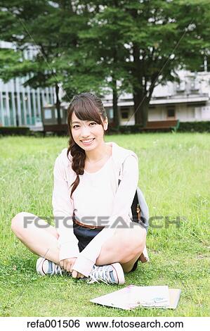 Stock Photograph - Young attractive Japanese female University student portrait. Fotosearch
