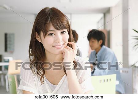 Stock Photography - Young attractive Japanese female University student portrait. Fotosearch
