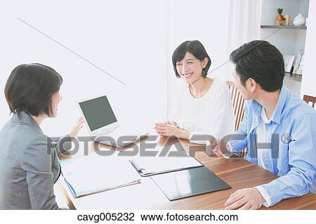 Young Japanese couple consulting with financial planner View Large Photo Image Stock Image - Young Japanese couple consulting with financial planner. Fotosearch