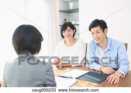 Young Japanese couple consulting with financial planner View Large Photo Image Stock Image - Young Japanese couple consulting with financial planner. Fotosearch