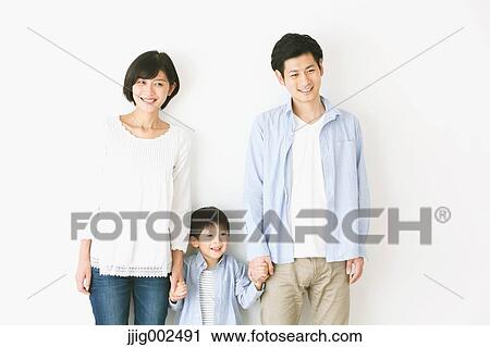 Stock Image - Young Japanese family. Fotosearch