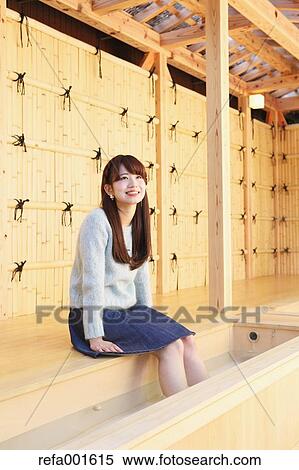 Stock Photography - Young Japanese woman enjoying foot spa in Kawagoe, Japan. Fotosearch
