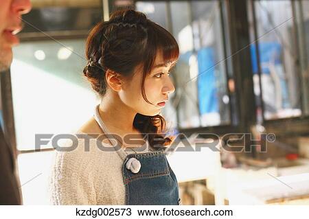Young Japanese woman enjoying glass crafting workshop in Kawagoe, Japan View Large Photo Image Stock Image - Young Japanese woman enjoying glass crafting workshop in Kawagoe, Japan. Fotosearch