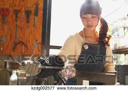 Young Japanese woman enjoying glass crafting workshop in Kawagoe, Japan View Large Photo Image Stock Photo - Young Japanese woman enjoying glass crafting workshop in Kawagoe, Japan. Fotosearch