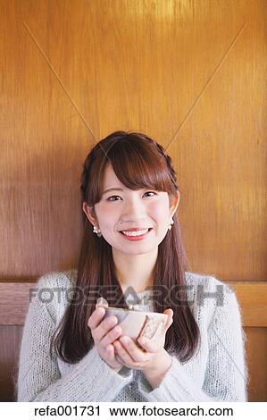 Young Japanese woman enjoying Maccha green tea in Kawagoe, Japan View Large Photo Image Stock Image - Young Japanese woman enjoying Maccha green tea in Kawagoe, Japan. Fotosearch