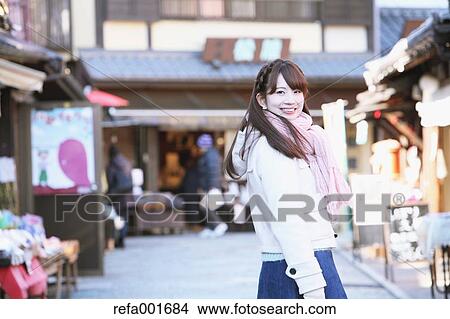Young Japanese woman enjoying trip in Kawagoe, Japan View Large Photo Image Picture - Young Japanese woman enjoying trip in Kawagoe, Japan. Fotosearch