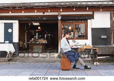 Young Japanese woman enjoying trip in Kawagoe, Japan View Large Photo Image Picture - Young Japanese woman enjoying trip in Kawagoe, Japan. Fotosearch