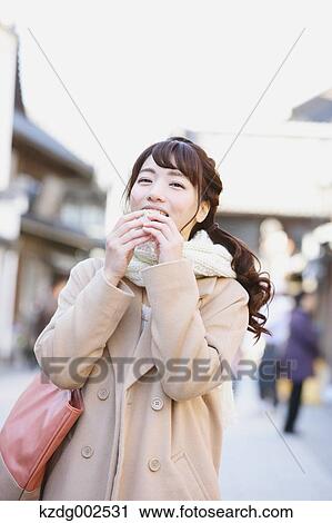 Young Japanese woman enjoying trip in Kawagoe, Japan View Large Photo Image Stock Image - Young Japanese woman enjoying trip in Kawagoe, Japan. Fotosearch
