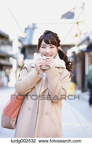 Young Japanese woman enjoying trip in Kawagoe, Japan View Large Photo Image Stock Image - Young Japanese woman enjoying trip in Kawagoe, Japan. Fotosearch