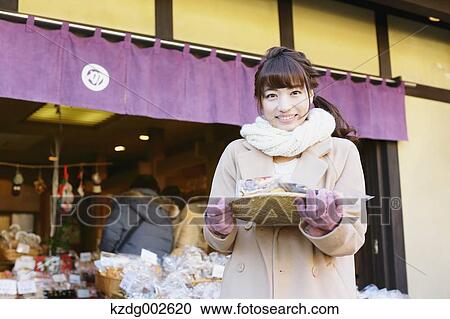 Young Japanese woman enjoying trip in Kawagoe, Japan View Large Photo Image Stock Image - Young Japanese woman enjoying trip in Kawagoe, Japan. Fotosearch