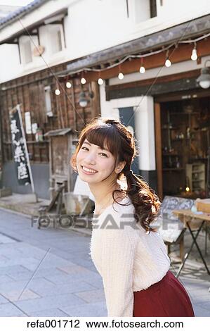 Young Japanese woman enjoying trip in Kawagoe, Japan View Large Photo Image Stock Image - Young Japanese woman enjoying trip in Kawagoe, Japan. Fotosearch