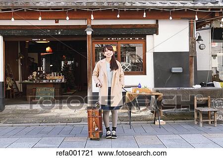 Young Japanese woman enjoying trip in Kawagoe, Japan View Large Photo Image Stock Image - Young Japanese woman enjoying trip in Kawagoe, Japan. Fotosearch
