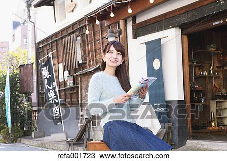 Young Japanese woman enjoying trip in Kawagoe, Japan View Large Photo Image Stock Image - Young Japanese woman enjoying trip in Kawagoe, Japan. Fotosearch
