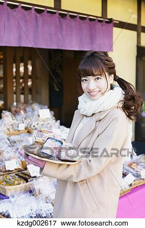 Young Japanese woman enjoying trip in Kawagoe, Japan View Large Photo Image Stock Photo - Young Japanese woman enjoying trip in Kawagoe, Japan. Fotosearch