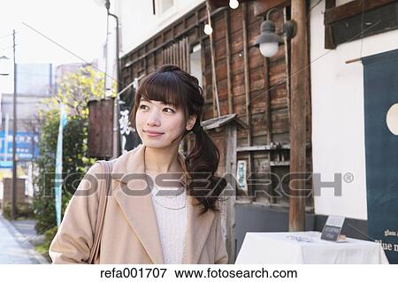 Young Japanese woman enjoying trip in Kawagoe, Japan View Large Photo Image Stock Photo - Young Japanese woman enjoying trip in Kawagoe, Japan. Fotosearch