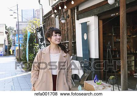 Young Japanese woman enjoying trip in Kawagoe, Japan View Large Photo Image Stock Photo - Young Japanese woman enjoying trip in Kawagoe, Japan. Fotosearch