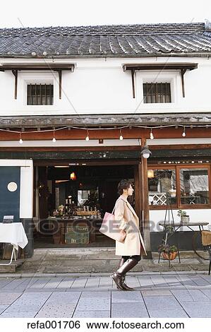 Young Japanese woman enjoying trip in Kawagoe, Japan View Large Photo Image Stock Photograph - Young Japanese woman enjoying trip in Kawagoe, Japan. Fotosearch