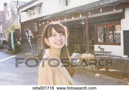 Young Japanese woman enjoying trip in Kawagoe, Japan View Large Photo Image Stock Photograph - Young Japanese woman enjoying trip in Kawagoe, Japan. Fotosearch