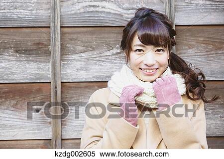 Stock Photography - Young Japanese woman enjoying trip in Kawagoe, Japan. Fotosearch