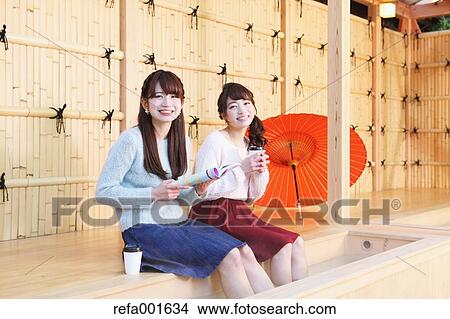 Young Japanese women enjoying foot spa in Kawagoe, Japan View Large Photo Image Picture - Young Japanese women enjoying foot spa in Kawagoe, Japan. Fotosearch