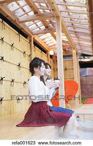 Young Japanese women enjoying foot spa in Kawagoe, Japan View Large Photo Image Stock Image - Young Japanese women enjoying foot spa in Kawagoe, Japan. Fotosearch