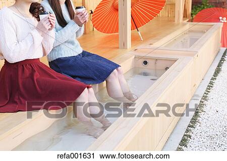 Young Japanese women enjoying foot spa in Kawagoe, Japan View Large Photo Image Stock Image - Young Japanese women enjoying foot spa in Kawagoe, Japan. Fotosearch