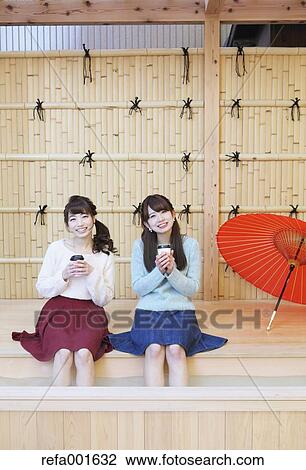 Young Japanese women enjoying foot spa in Kawagoe, Japan View Large Photo Image Stock Image - Young Japanese women enjoying foot spa in Kawagoe, Japan. Fotosearch