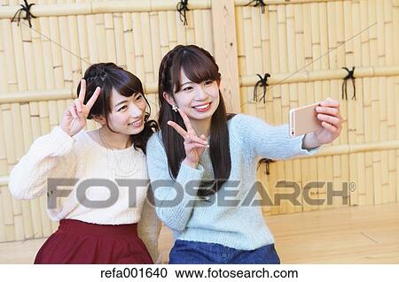 Young Japanese women enjoying foot spa in Kawagoe, Japan View Large Photo Image Stock Image - Young Japanese women enjoying foot spa in Kawagoe, Japan. Fotosearch