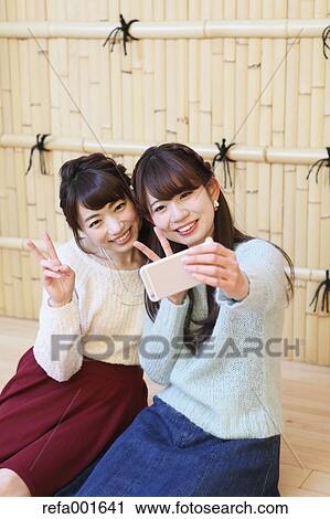 Young Japanese women enjoying foot spa in Kawagoe, Japan View Large Photo Image Stock Image - Young Japanese women enjoying foot spa in Kawagoe, Japan. Fotosearch