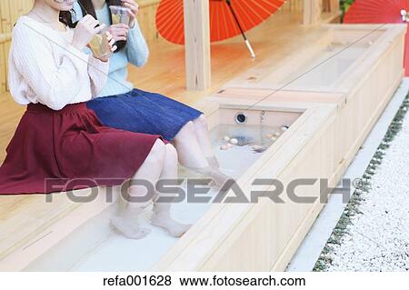 Young Japanese women enjoying foot spa in Kawagoe, Japan View Large Photo Image Stock Photo - Young Japanese women enjoying foot spa in Kawagoe, Japan. Fotosearch