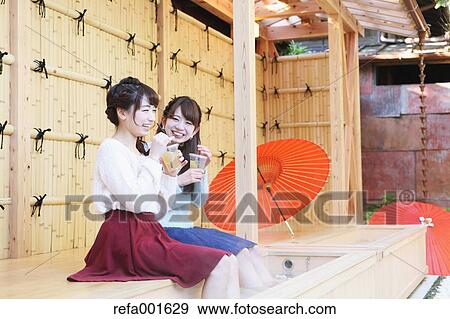 Young Japanese women enjoying foot spa in Kawagoe, Japan View Large Photo Image Stock Photo - Young Japanese women enjoying foot spa in Kawagoe, Japan. Fotosearch