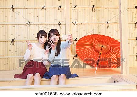 Young Japanese women enjoying foot spa in Kawagoe, Japan View Large Photo Image Stock Photo - Young Japanese women enjoying foot spa in Kawagoe, Japan. Fotosearch