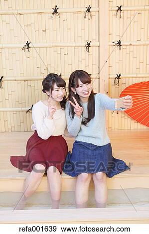 Young Japanese women enjoying foot spa in Kawagoe, Japan View Large Photo Image Stock Photo - Young Japanese women enjoying foot spa in Kawagoe, Japan. Fotosearch