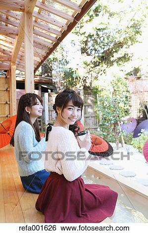 Young Japanese women enjoying foot spa in Kawagoe, Japan View Large Photo Image Stock Photograph - Young Japanese women enjoying foot spa in Kawagoe, Japan. Fotosearch