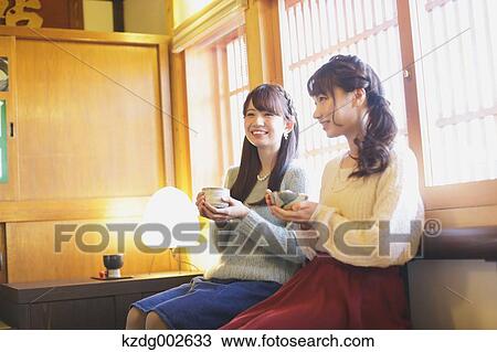 Young Japanese women enjoying Maccha green tea in Kawagoe, Japan View Large Photo Image Stock Image - Young Japanese women enjoying Maccha green tea in Kawagoe, Japan. Fotosearch