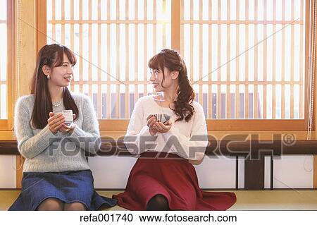 Young Japanese women enjoying Maccha green tea in Kawagoe, Japan View Large Photo Image Stock Image - Young Japanese women enjoying Maccha green tea in Kawagoe, Japan. Fotosearch